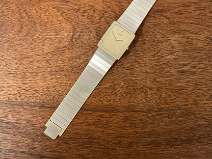 (1983) Seiko 6730-565H Lassale ultra thin - stainless steel bracelet - brushed gold dial w/ black stick markers (NOS)