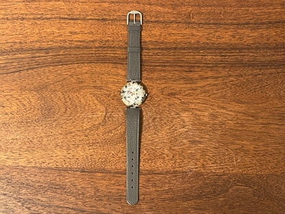 (1980s) Tissot RockWatch R150 beige/black granite - mid size model (NOS)