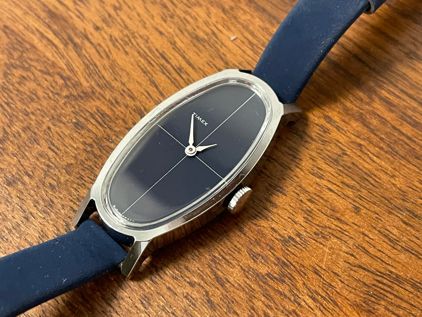 (1970s) Timex 519-105 dress watch - elongated oval case - black cross dial - small size (NOS + full set)