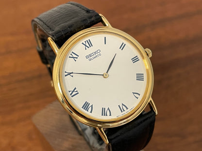 (1991) Seiko 7N00-8A00 dress watch - white dial w/ Roman numerals & Leafe hands (NOS)