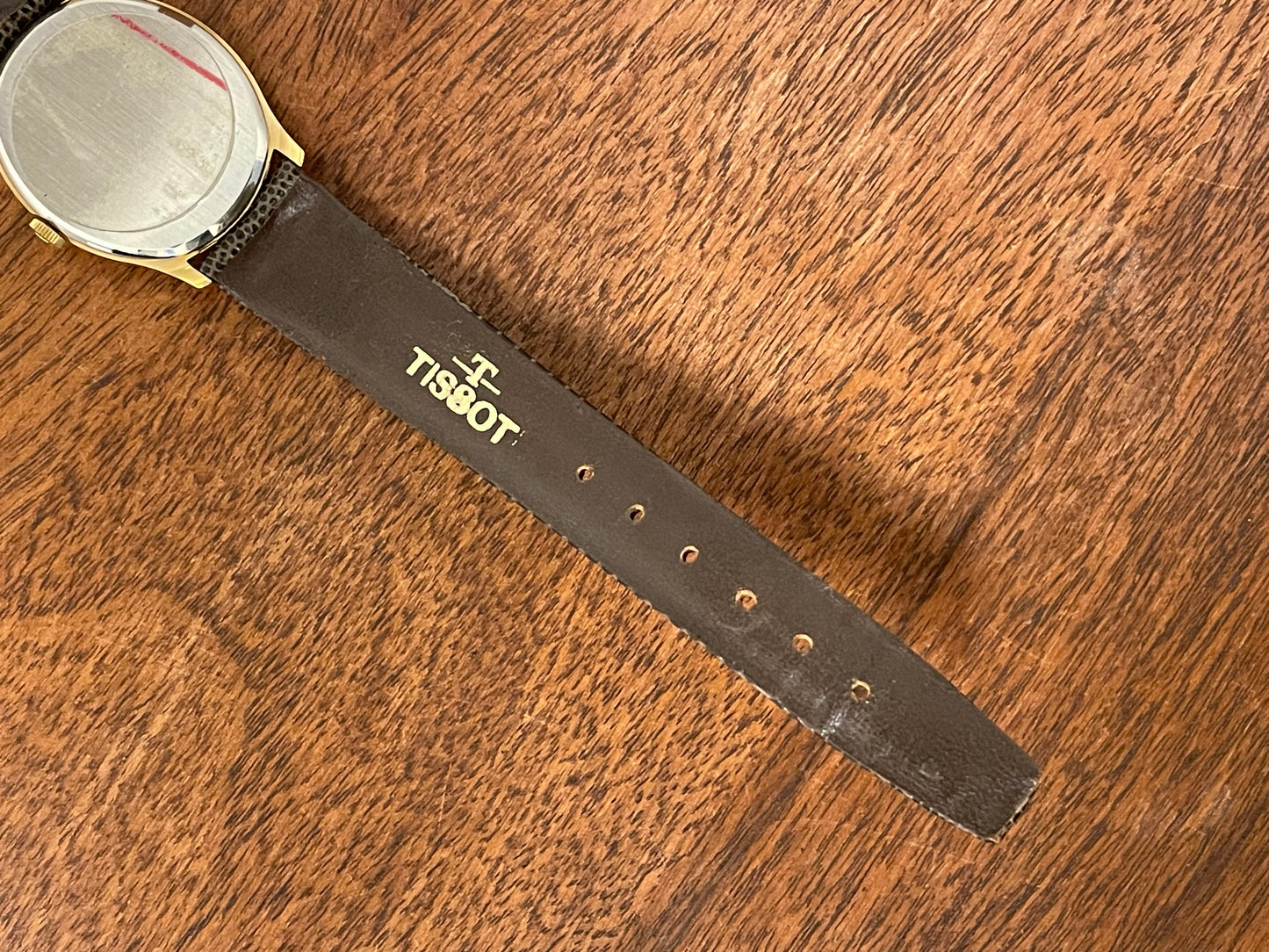 (1970s) Tissot 41141 "Ellipse" dress watch - gold case - silver brushed dial w/ gold stick markers (NOS)
