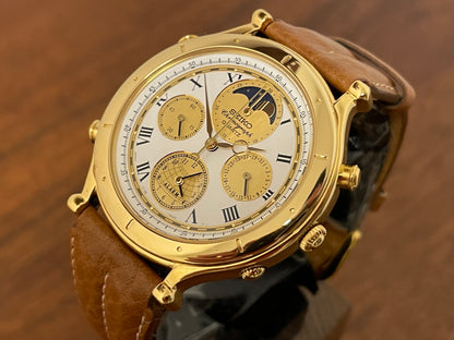 (1990) Seiko 7T36-7A10 Age of Discovery (AOD) chronograph - gold colored case - white dial w/ gold subdials & moonphase