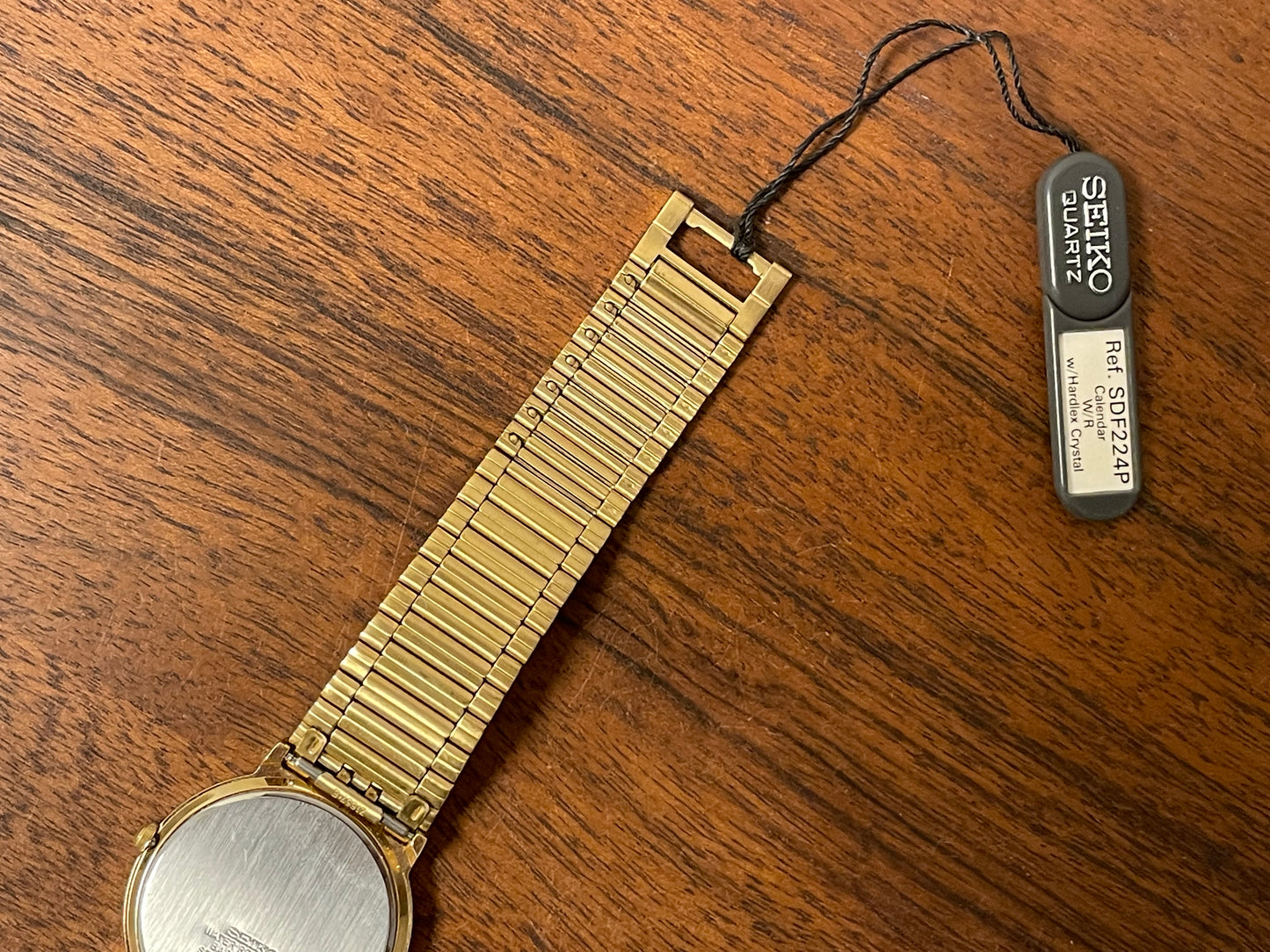 (1992) Seiko 5Y89-7A10 dress watch – white dial w/ Roman numerals & date (NOS)