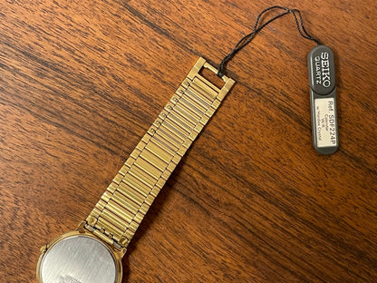 (1992) Seiko 5Y89-7A10 dress watch – white dial w/ Roman numerals & date (NOS)