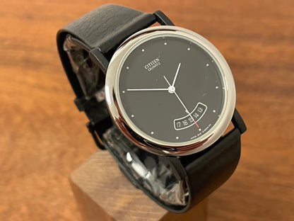 (1989) Citizen QD9022-05E dress watch - black lugs - black dial w/ arc date window (NOS)