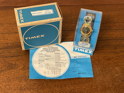 (1970s) Timex 551-211 dress watch - gold case - green dial w/ gold markers - small size (NOS + full set)