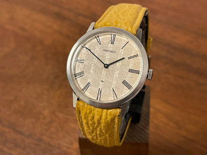 Front side (1976) Seiko 2220-0180 Chariot dress watch - silver textured waffle dial w/ Roman numerals