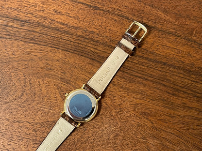 (2000) Pulsar V532-8A60 dress watch - gold colored case - white dial w/ black Roman numerals (NOS)