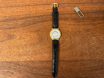 (1999) Pulsar V339-6000 world Timer - gold case - rotating white dial w/ gold markers (NOS)