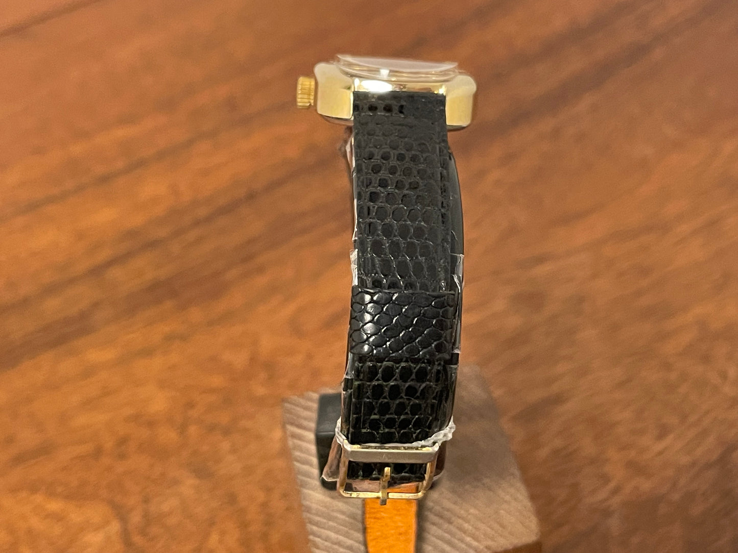 (1979) Timex 100 manual wind dress watch - Swiss made - tonneau case - black dial w/ gold markers
