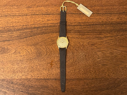 (1987) Citizen 37-9085-82 dress watch - gold colored case w/ champagne dial (NOS)