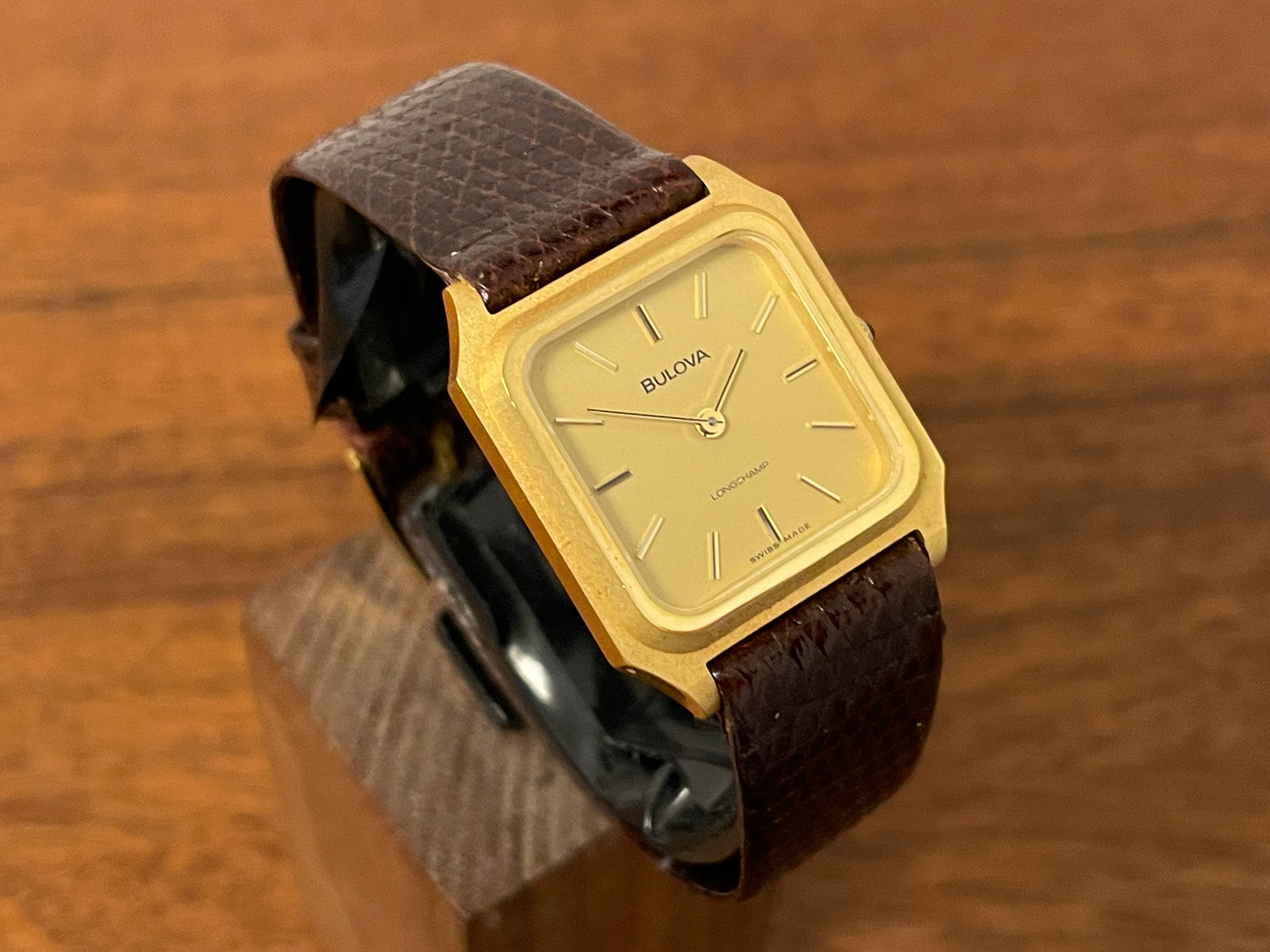 (1982) Bulova Longchamp "Tank" dress watch - gold case w/ champagne dial - small size (NOS)