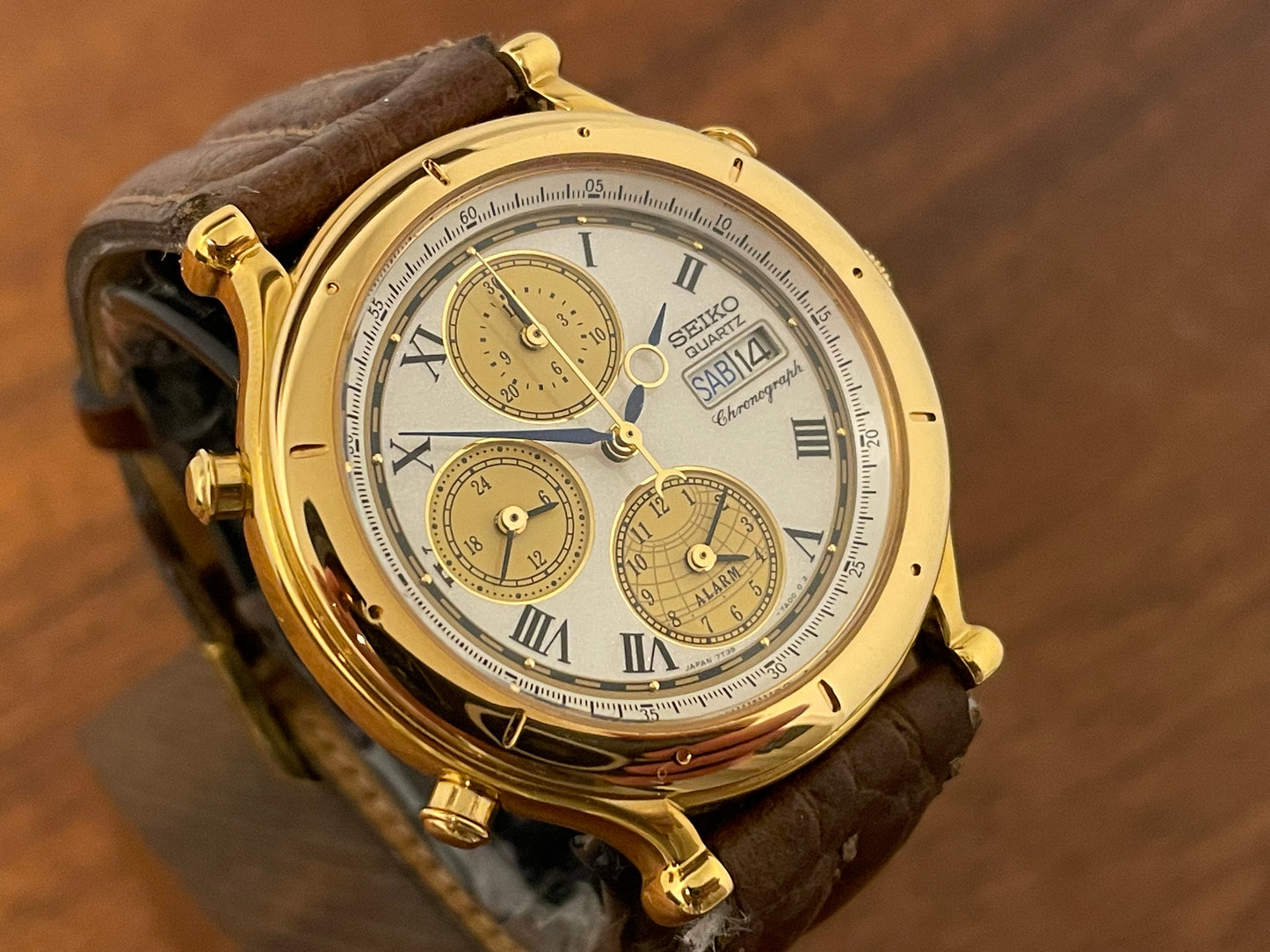 (1992) Seiko 7T39-7A00 Age of Discovery (AOD) chronograph -  gold case w/ white speckled dial (NOS)