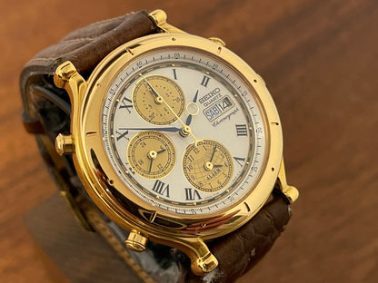 (1992) Seiko 7T39-7A00 Age of Discovery (AOD) chronograph -  gold case w/ white speckled dial (NOS)
