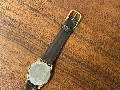 (1970s) Tissot 41141 "Ellipse" dress watch - gold case - silver brushed dial w/ gold stick markers (NOS)