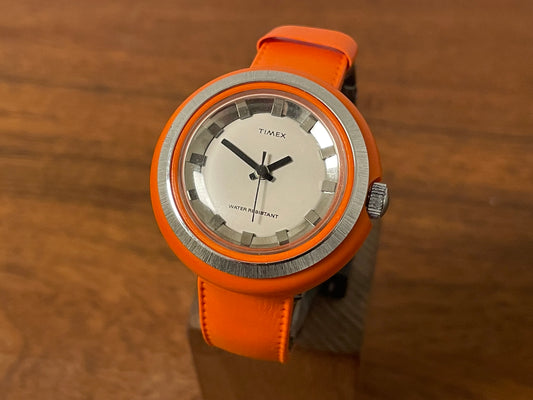 Front side (1970s) Timex 290-181 UFO - orange plastic case - white dial w/ silver markers - small size (NOS + full set)