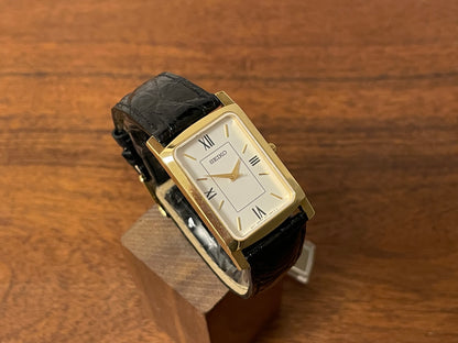 (1990s) Seiko 7N01-0BA8 18K gold collection "tank" - 18k solid gold case - white & cream dial (NOS + full set)