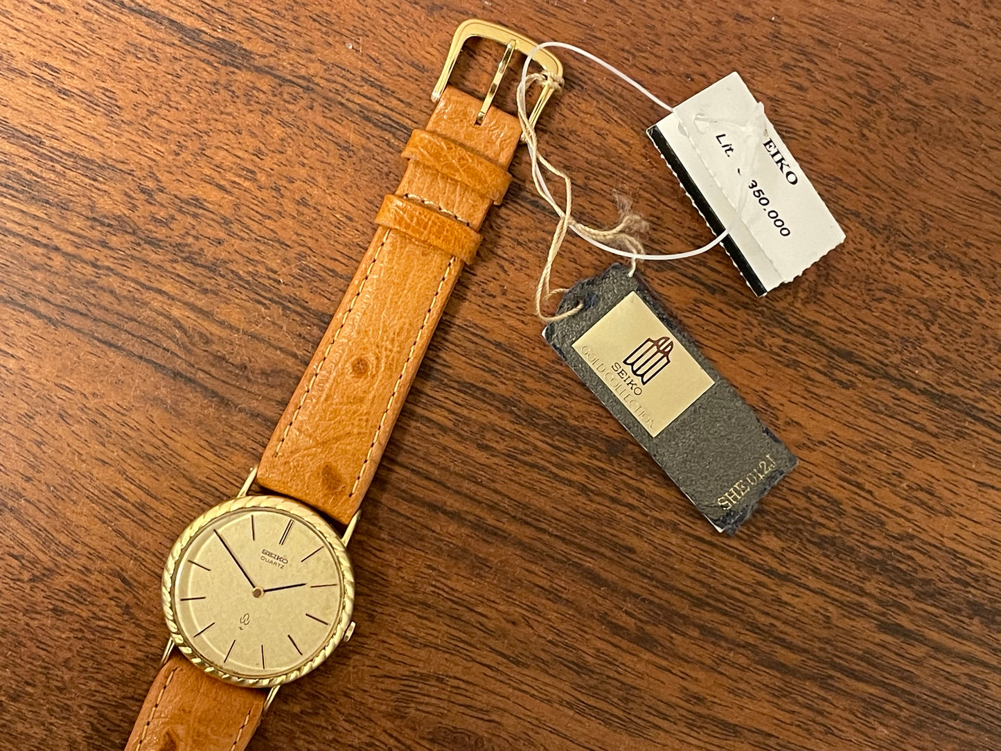 (1977) Seiko 43-0150 14K solid gold dress watch - rope bezel -  gold textured dial w/ gold markers