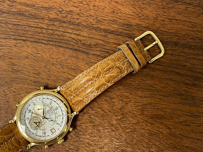 (1994) Seiko 6m13-0010 Age of Discovery (AOD) Perpetual Calendar - gold colored case - white dial w/ black Roman numerals