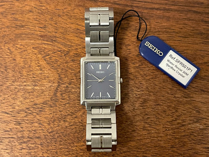 (1991) Seiko 7N01-5C90 - integrated bracelet - blue dial w/ silver markers (NOS)