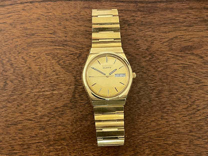 (1982) Seiko 8223-6060 SQ - Solid Gold Plated (SGP) case with gold dial