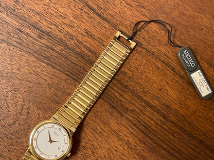(1992) Seiko 5Y89-7A10 dress watch – white dial w/ Roman numerals & date (NOS)