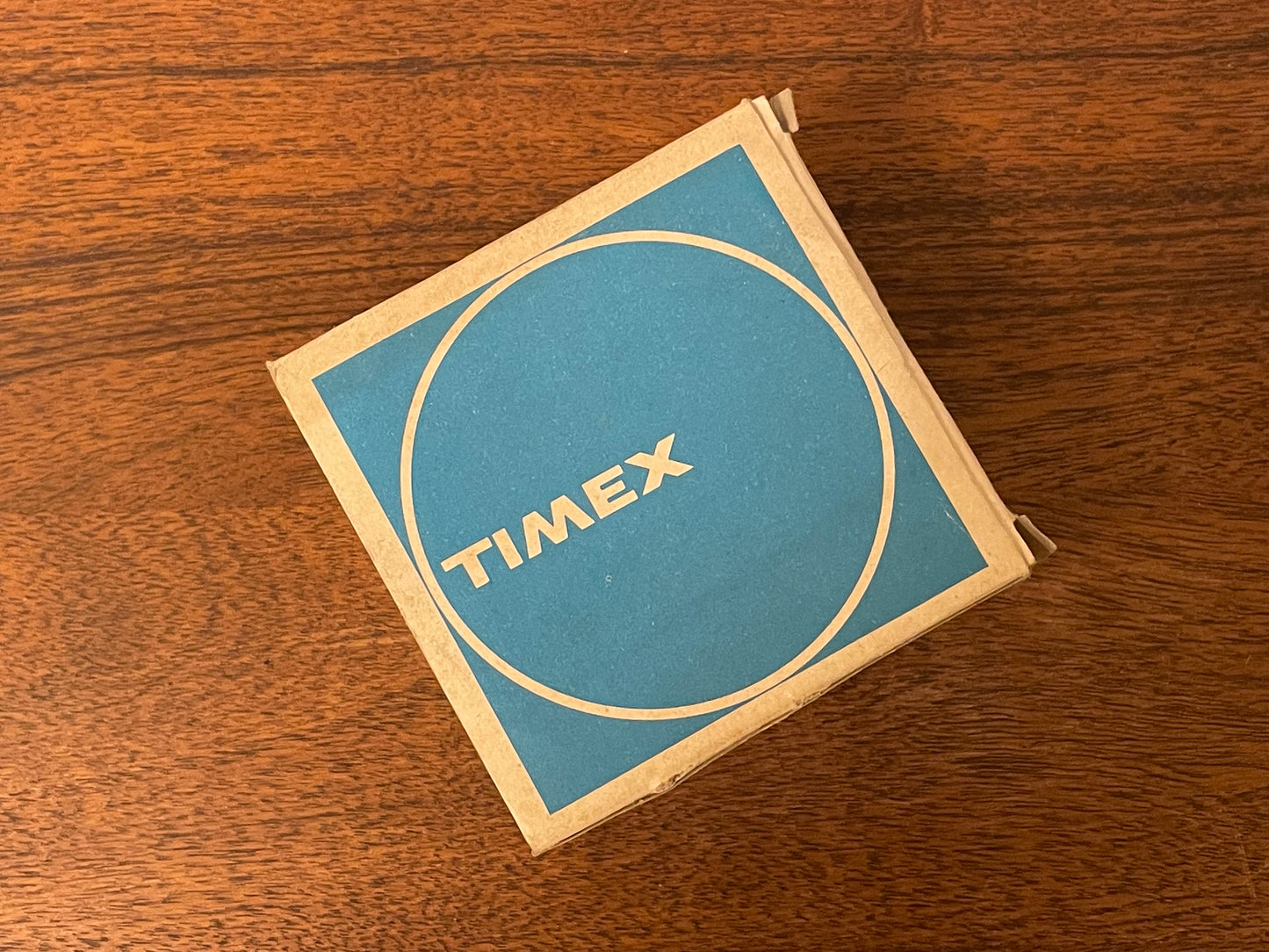 (1970s) Timex 290-181 UFO - orange plastic case - white dial w/ silver markers - small size (NOS + full set)