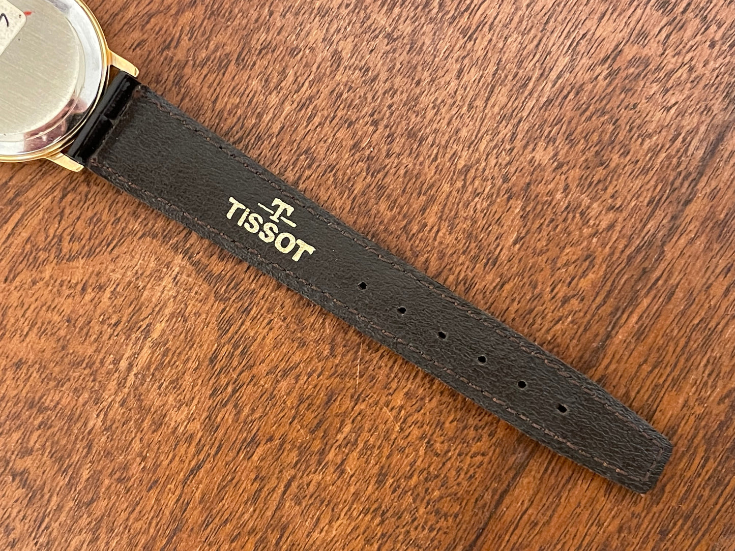 (1970s) Tissot 40771 Stylist dress watch - gold case - brushed gold dial w/ black Roman numerals (NOS)