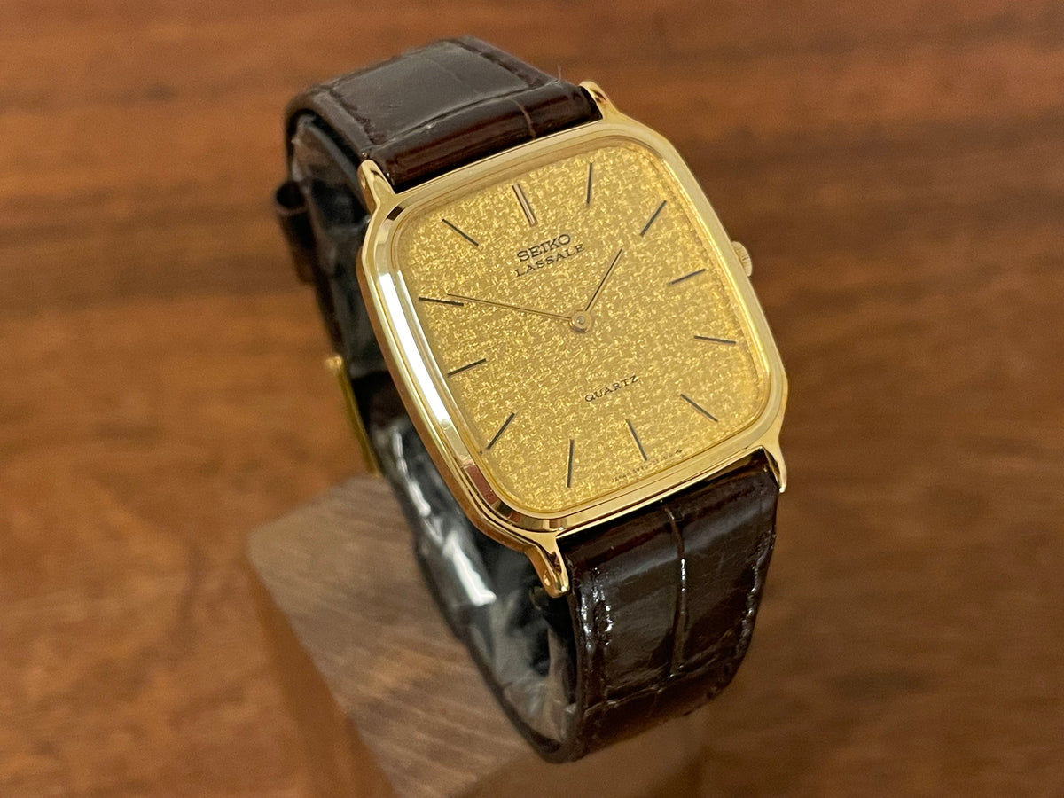 (1981) Seiko 5930-5509 Lassale dress watch - gold textured dial w/ gold stick markers (NOS)