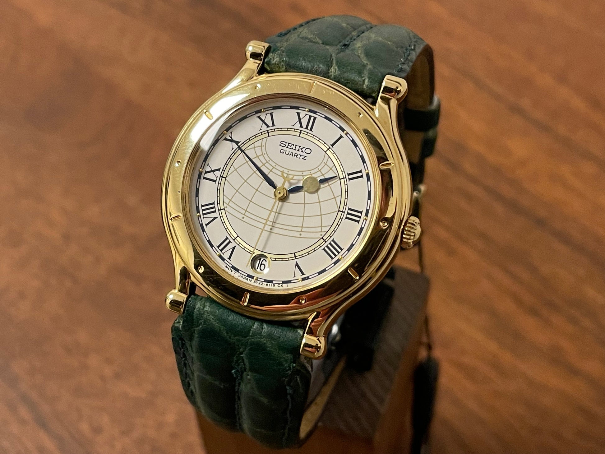 Front side (1999) Seiko 5Y22-6050 Age of Discovery (AOD) dress watch - white dial w/ black Roman numerals (NOS)