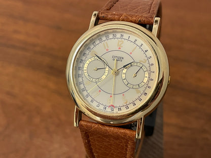 (1988) Citizen 6355-Y55299 triple calendar - cream dial w/ gold Arabic numerals (mint)