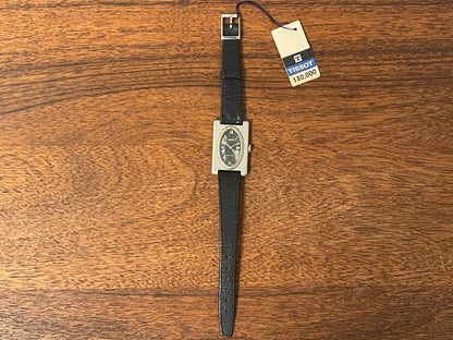 (1970s) Tissot Stylist "Tank" - decorated case - black sunburst dial w/ white Roman numerals - small size (NOS)