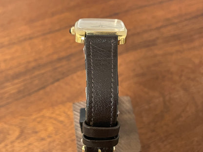 (1970s) Tissot 642-10778 Stylist dress watch - gold square case - gold brushed dial w/ gold stick markers - small size (NOS)