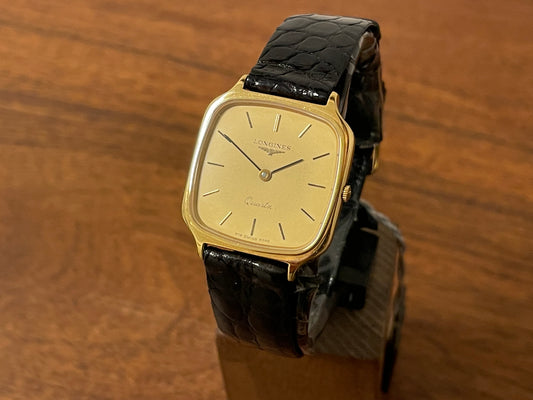 Front side (1980s) Longines 978 6398 dress watch - gold plated case - gold dial w/ stick markers (NOS)