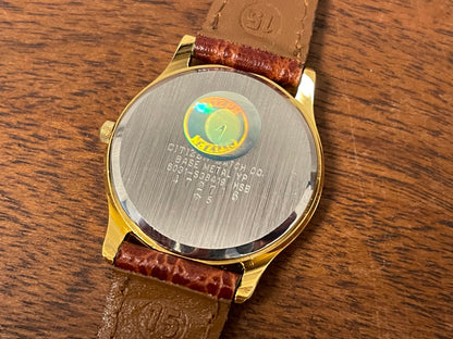 (1981) Citizen 6031-S38419 dress watch - white dial w/ gold Roman numerals - small size (NOS)