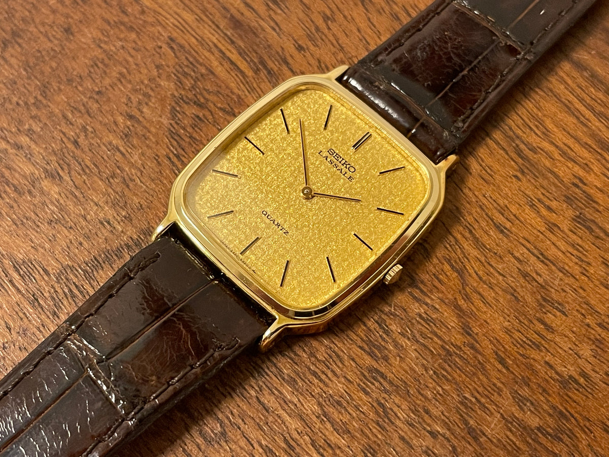 (1981) Seiko 5930-5509 Lassale dress watch - gold textured dial w/ gold stick markers (NOS)