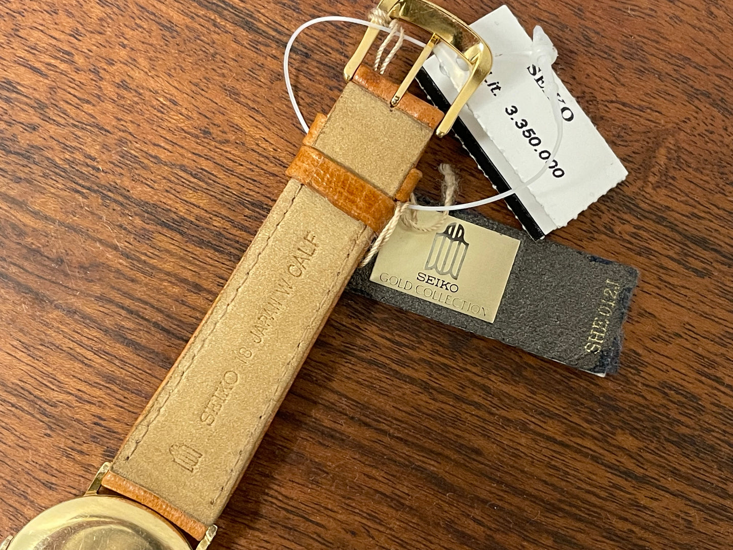(1977) Seiko 43-0150 14K solid gold dress watch - rope bezel -  gold textured dial w/ gold markers