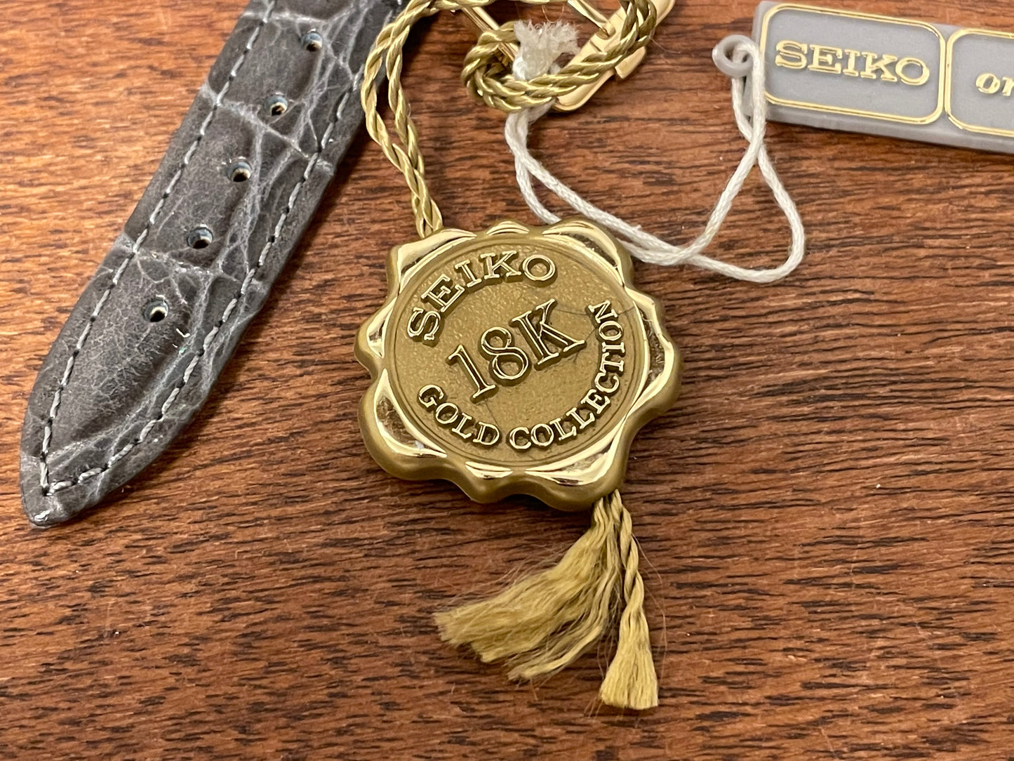 Seiko 18k Gold Collection label