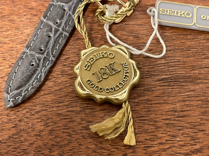 Seiko 18k Gold Collection label