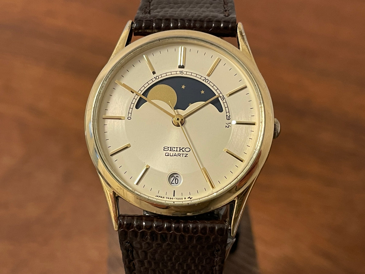 (1984) Seiko 7434-7000 dress watch - champagne dial w/ moonphase & stick markers