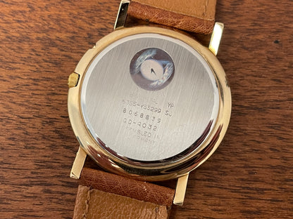 (1988) Citizen 6355-Y55299 triple calendar - cream dial w/ gold Arabic numerals (mint)