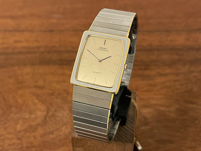 Front side (1983) Seiko 6730-565H Lassale ultra thin - stainless steel bracelet - brushed gold dial w/ black stick markers (NOS)