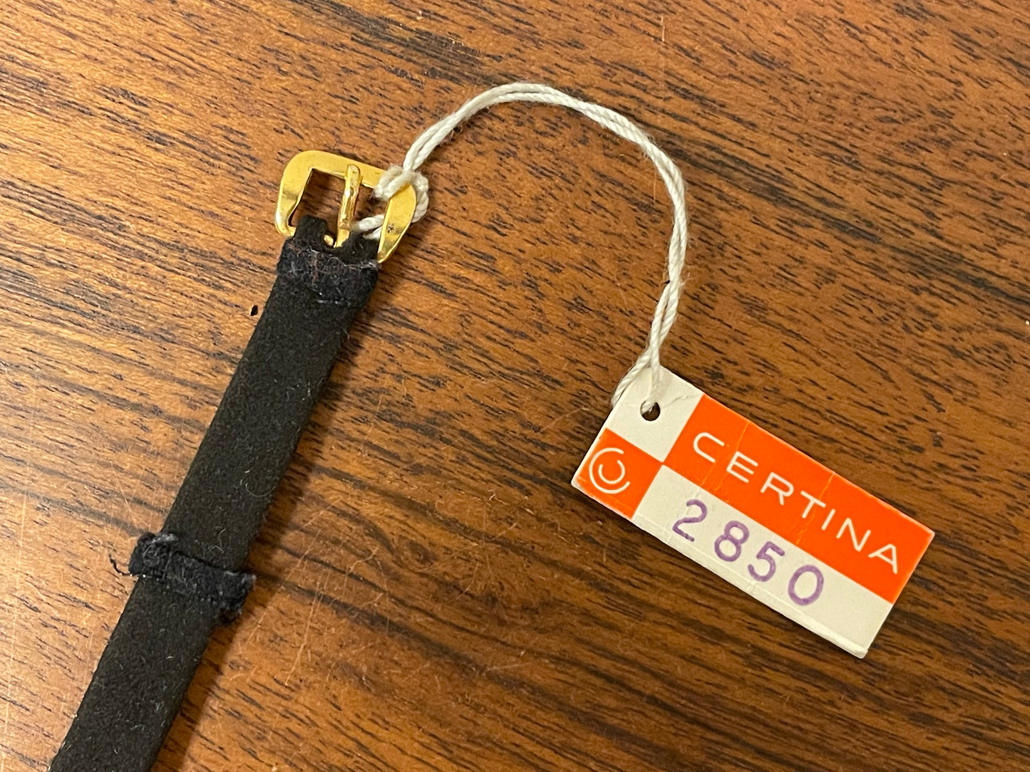 (1970s) Certina 2850 "cocktail" dress watch - silver sunburst dial w/ stick markers - small size (NOS)
