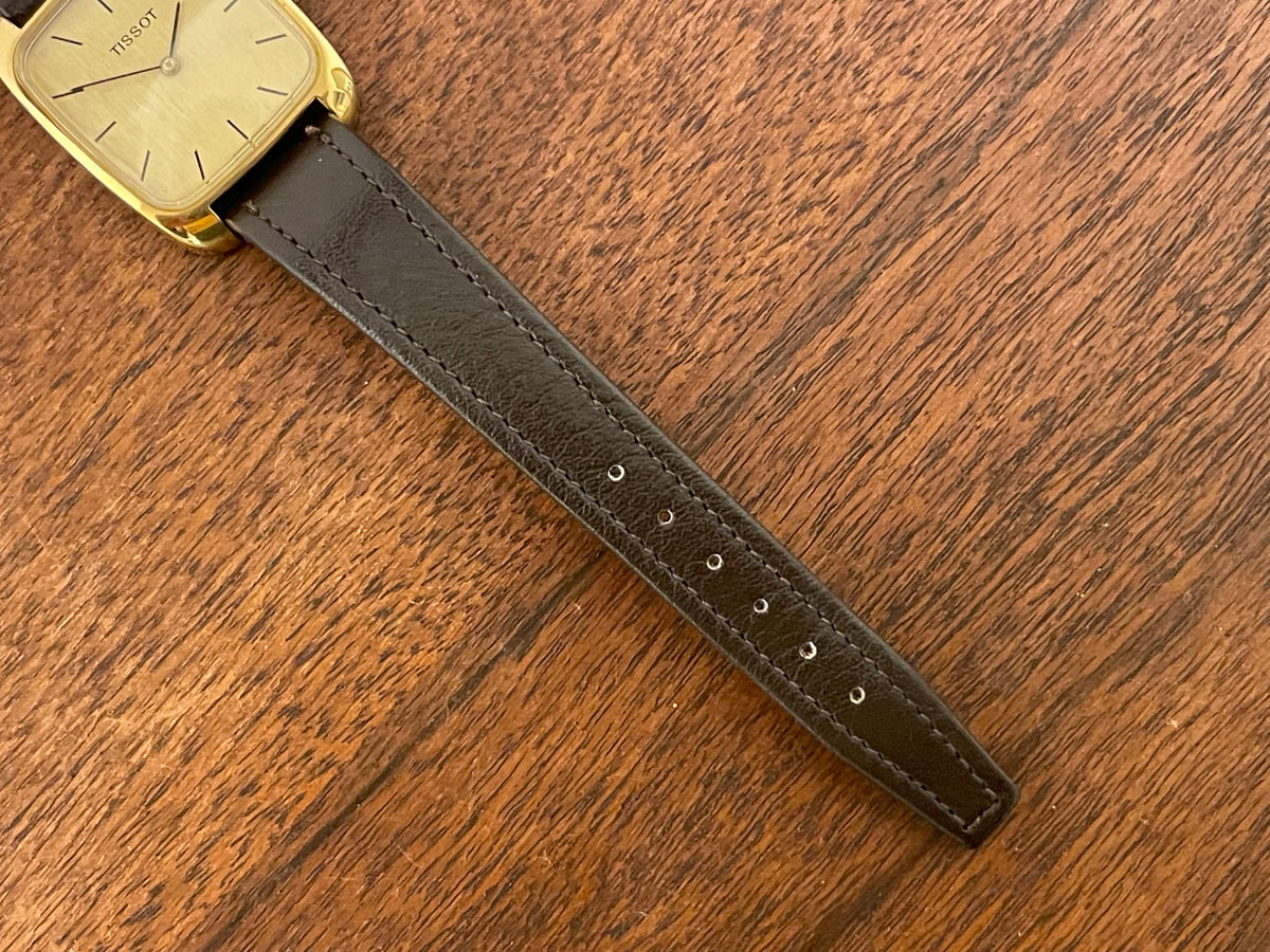 (1970s) Tissot 642-10778 Stylist dress watch - gold square case - gold brushed dial w/ gold stick markers - small size (NOS)