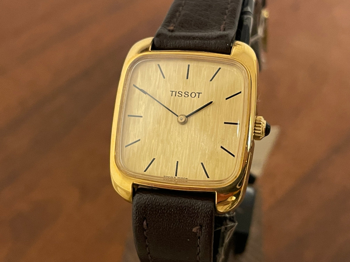 (1970s) Tissot 642-10778 Stylist dress watch - gold square case - gold brushed dial w/ gold stick markers - small size (NOS)