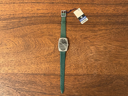 (1970s) Tissot Stylist dress watch - oval grey sunburst dial w/ white stick markers - small size (NOS)
