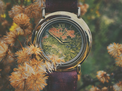 Hans Hirsch Edelsteinuhr vintage watch with flowers and grass