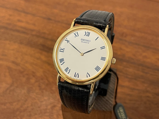 Front side (1991) Seiko 7N00-8A00 dress watch - white dial w/ Roman numerals & Leafe hands (NOS)