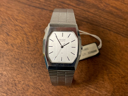 (1977) Ricoh 702008SS dress watch - silver brushed dial w/ silver markers (NOS)