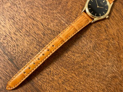 (1993) Seiko 4N00-0591 dress watch - gold bezel w/ black dial and gold markers - small size (NOS)